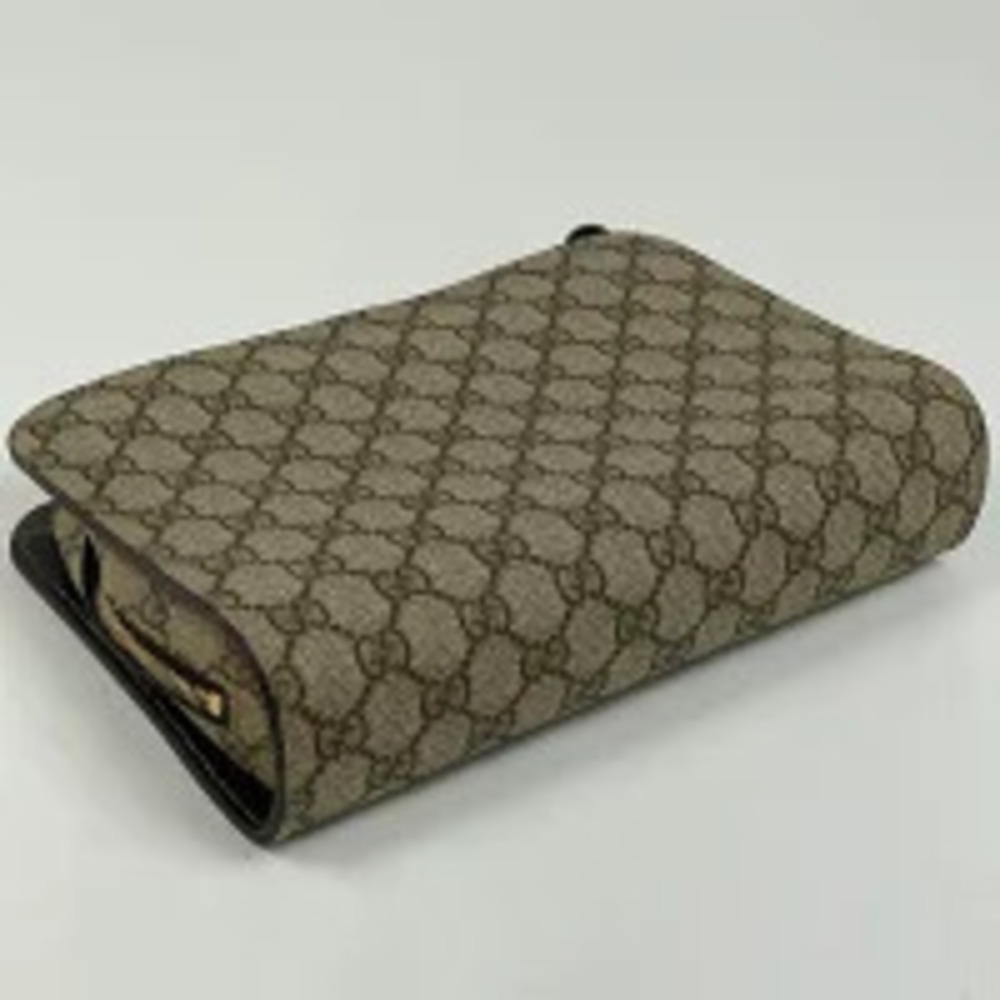 Gucci canvas clutch bag beige GG Tan